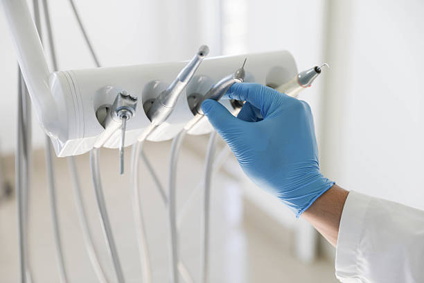 Professional Tooth Extraction technician working in Island City, OR